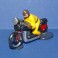 Moto jaune suiveur course cycliste