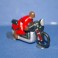 Moto rouge suiveur course cycliste